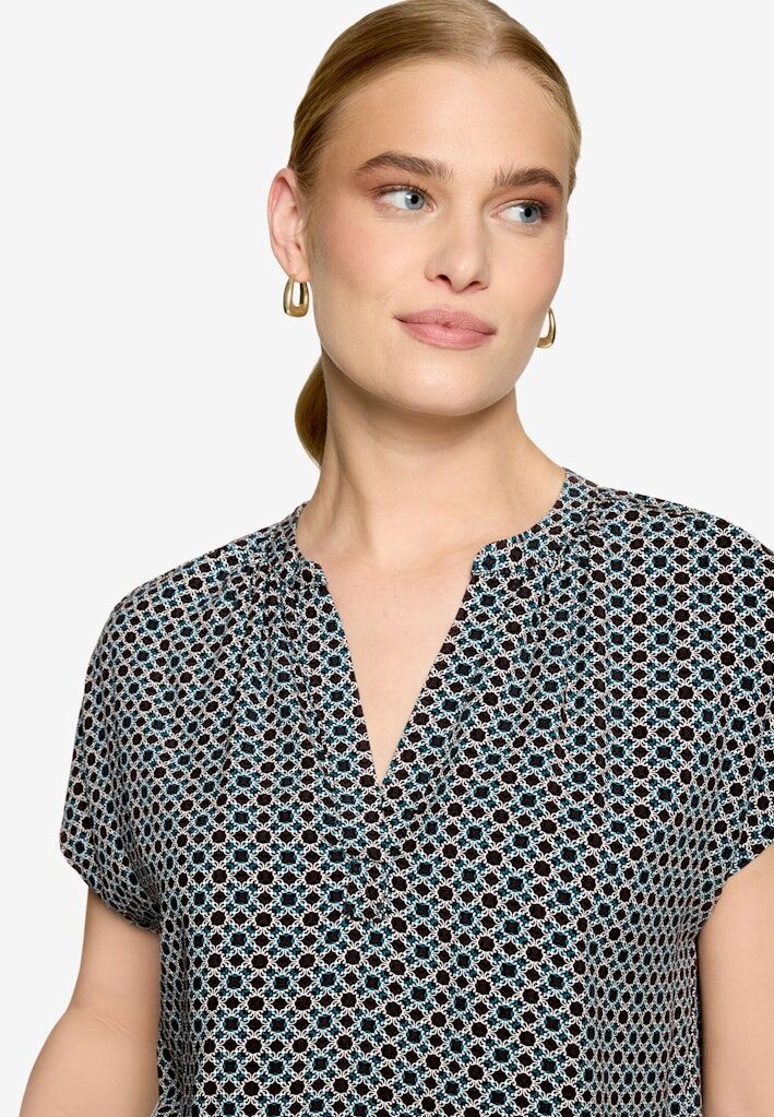 Blusenshirt mit grafischem Muster Blusenshirt mit grafischem Muster